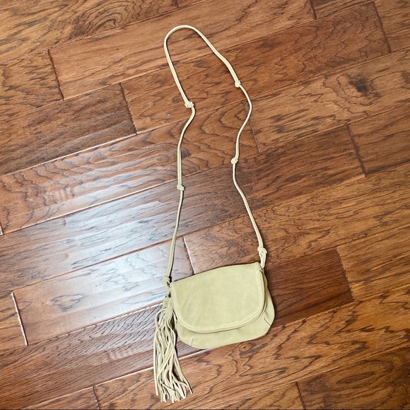 Urban Outfitters Handbags - Urban Outfitters Kimchi Suede Tassel CrossBody Bag